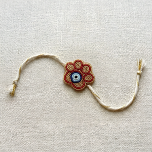 Evil Eye Paw Bead Work Rakhi for Dogs | Pawgy Pets